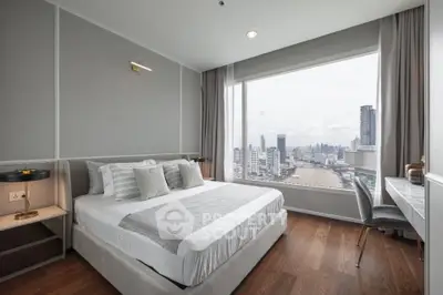 Luxurious bedroom with stunning city view and elegant decor
