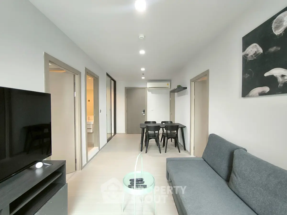 Modern living room with sleek furniture and minimalist decor