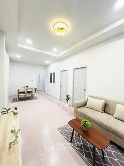 Spacious modern living room with elegant decor and cozy seating area