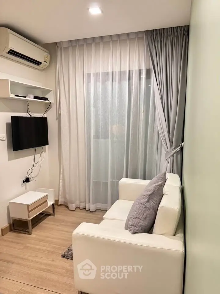 Cozy living room with modern decor and natural light