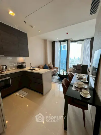 Modern open-layout kitchen and living room with city view, sleek furniture, and dining area.