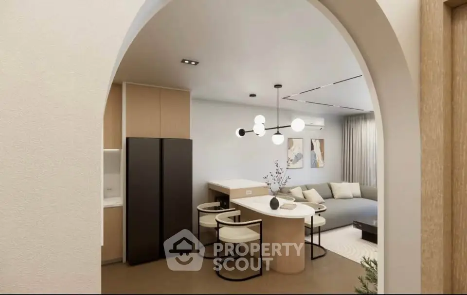 Modern open-plan living room with stylish furniture and elegant lighting in a contemporary apartment.