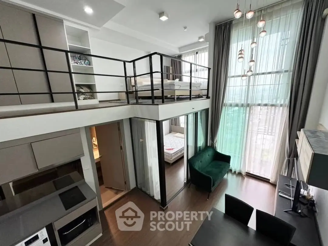 Modern loft apartment with high ceilings, mezzanine bedroom, and stylish living area.