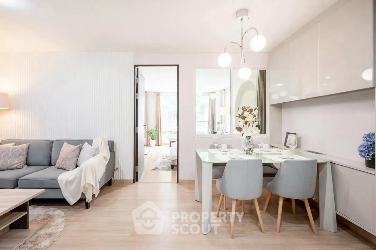 Modern living room with elegant dining area and stylish decor