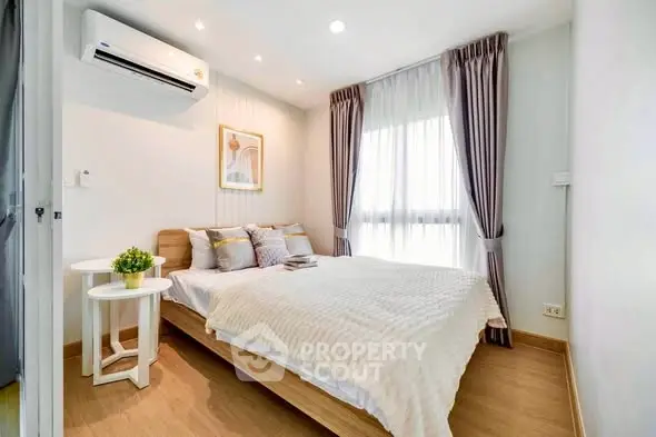 Bright and cozy bedroom with modern decor and natural light