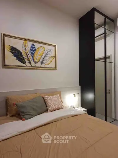 Cozy bedroom with modern decor and stylish wall art