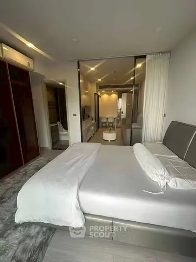 Luxurious modern bedroom with sleek design and open layout