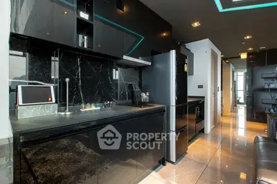 Luxurious modern kitchen with sleek black cabinetry and high-end appliances