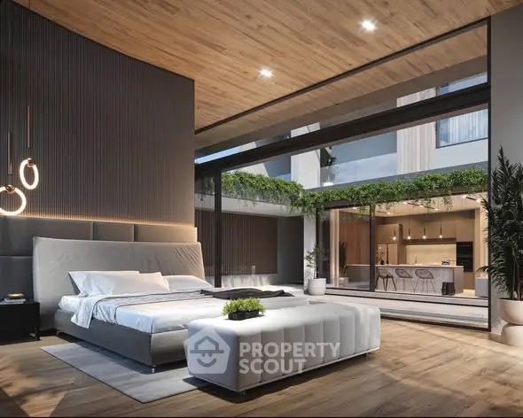 Luxurious modern bedroom with open balcony and garden view, featuring elegant decor and spacious design.