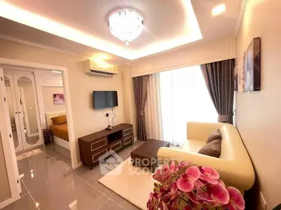 Elegant living room with modern decor and natural light in a stylish apartment.