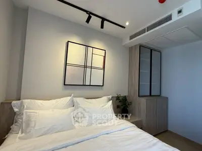 Modern bedroom with stylish decor and cozy ambiance