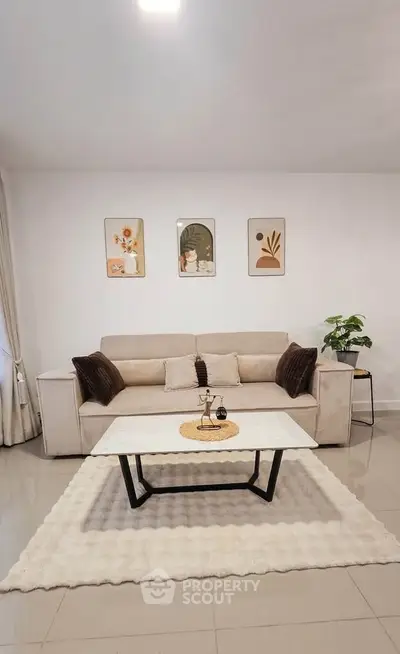 Elegant living room with modern decor and cozy seating area
