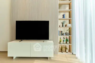 Modern living room with sleek TV stand and stylish shelving unit