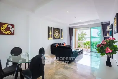 Spacious modern living room with elegant decor and balcony view