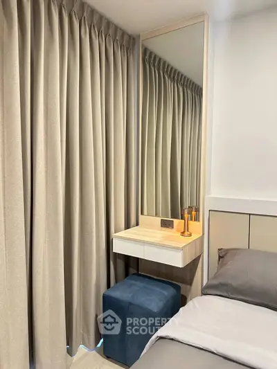 Cozy bedroom corner with elegant curtains and stylish vanity mirror