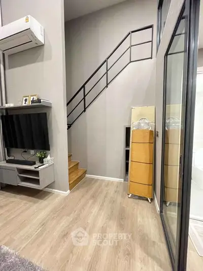 Modern duplex interior with sleek staircase and stylish decor