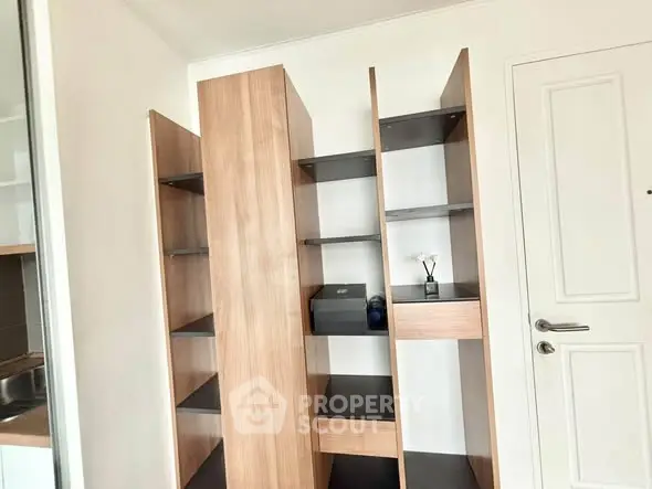 Modern storage shelves in a bright room with sleek design and ample space.