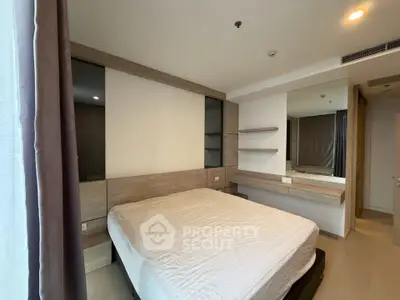 Modern bedroom with sleek design and ample natural light