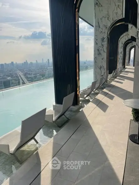 Luxurious rooftop infinity pool with stunning city skyline views