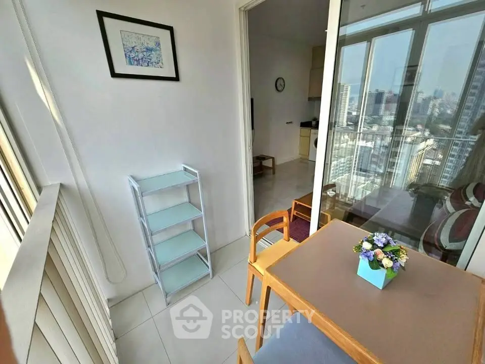 Charming balcony with city view, perfect for relaxation and enjoying the skyline.