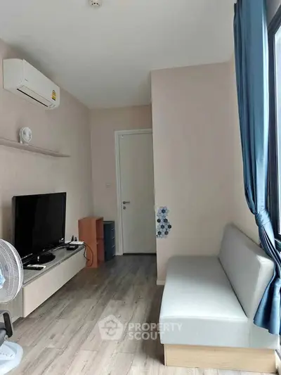 Modern living room with sleek furniture and natural light