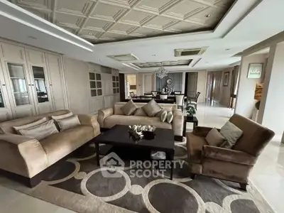 Luxurious living room with elegant furniture and stylish decor in a spacious open layout.