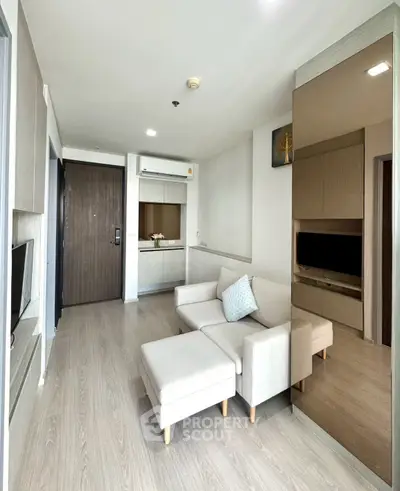 Modern living room with stylish furniture and sleek design in a contemporary apartment.