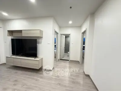 Modern living room with sleek TV unit and minimalist design