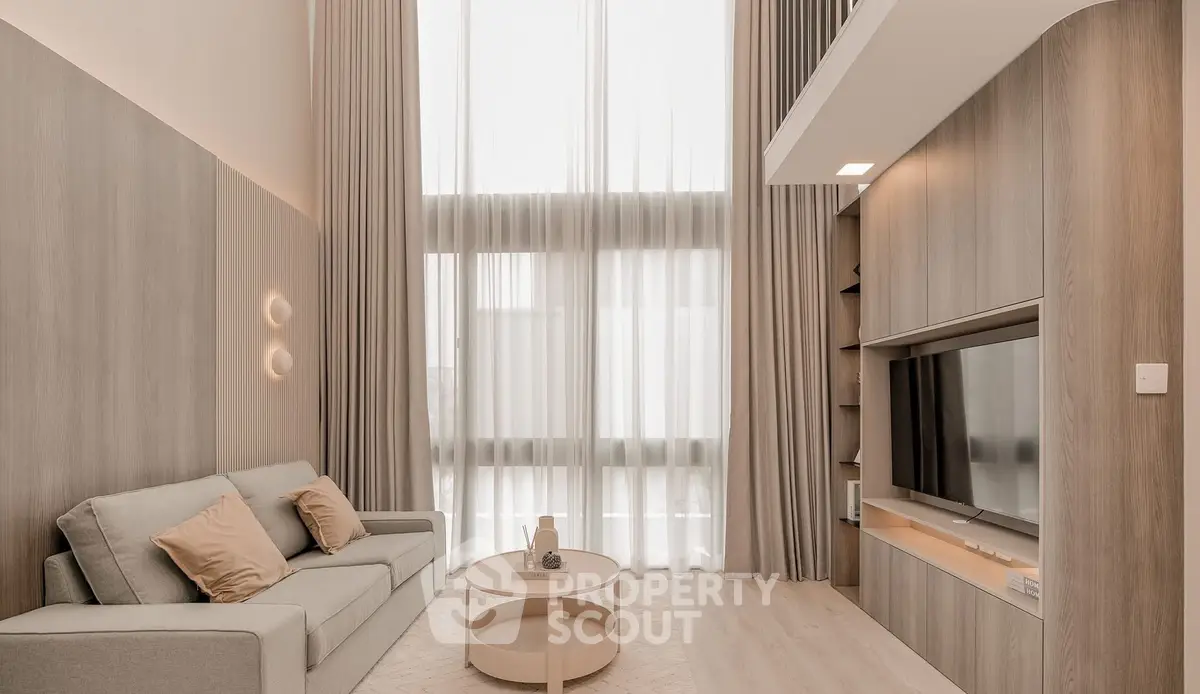 Luxurious modern living room with high ceilings and elegant decor