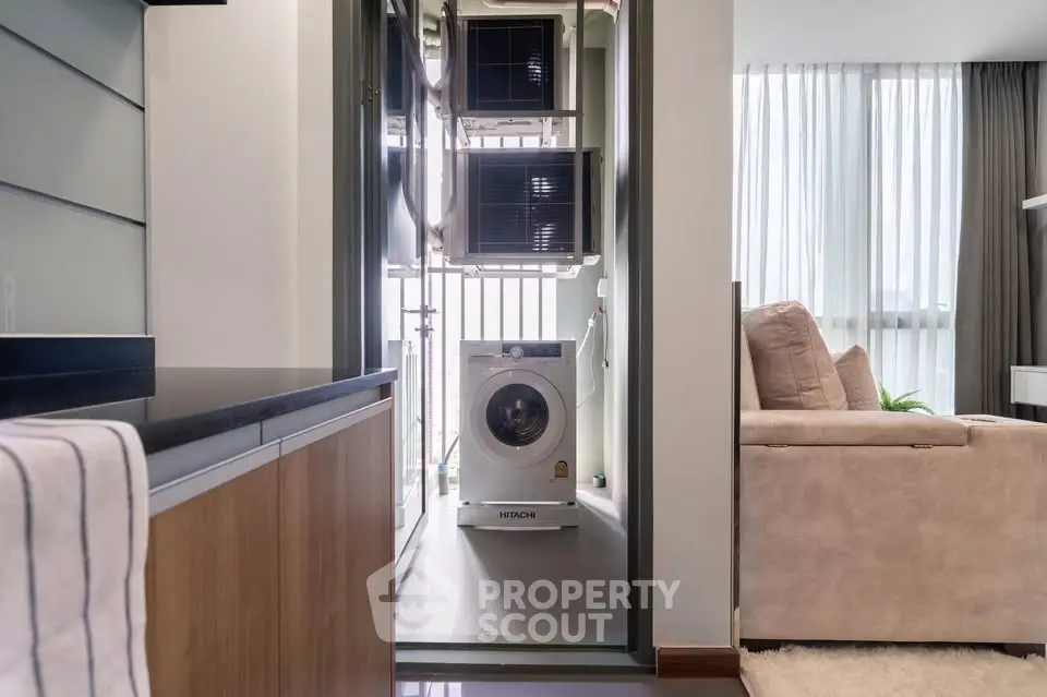 Modern apartment with washing machine and cozy living area