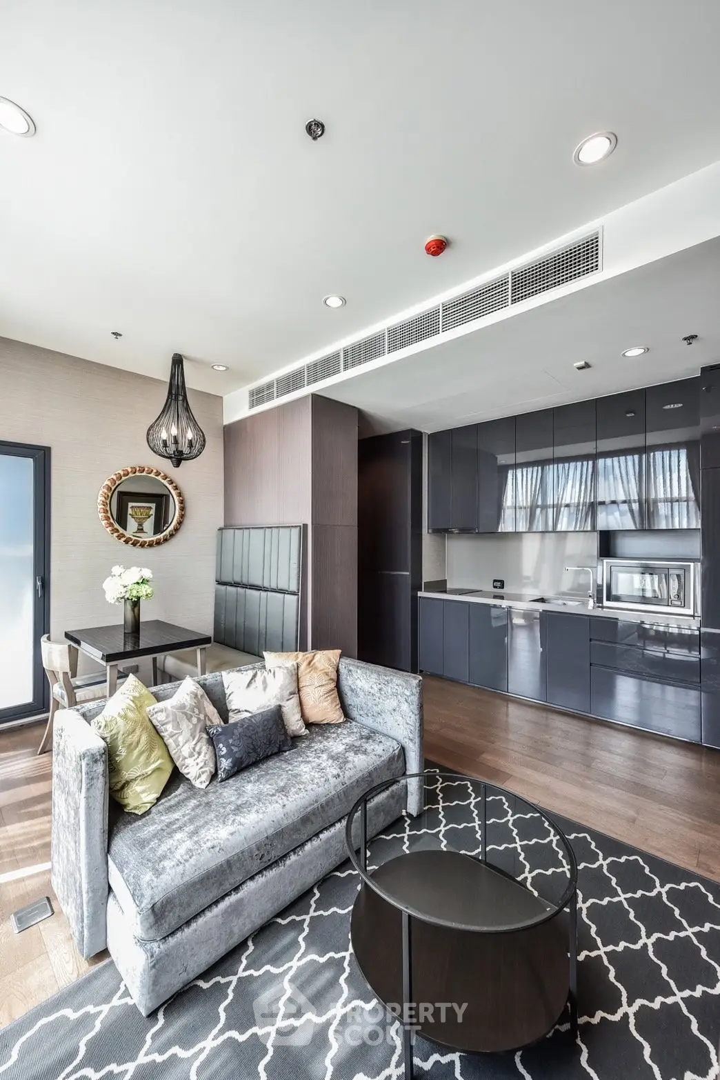 Luxurious modern living room with open kitchen and stylish decor