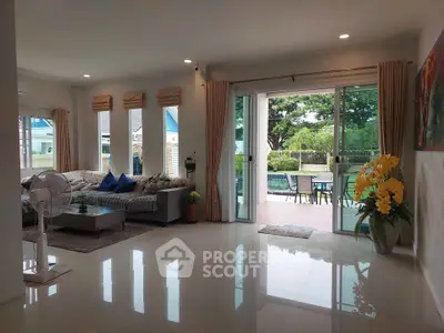 Spacious living room with garden view and elegant decor