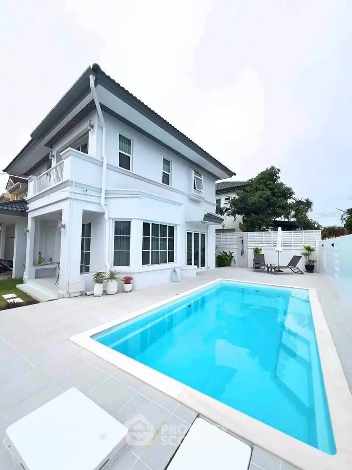 Stunning modern two-story home with private pool and spacious outdoor area, perfect for luxury living.