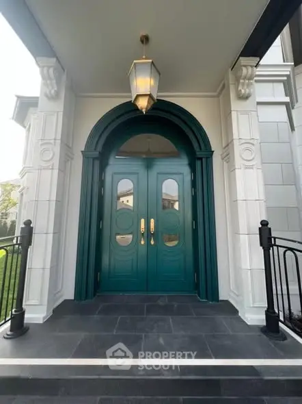 Elegant entrance with double doors and classic architectural details