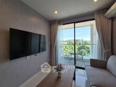 Modern living room with balcony view and sleek decor