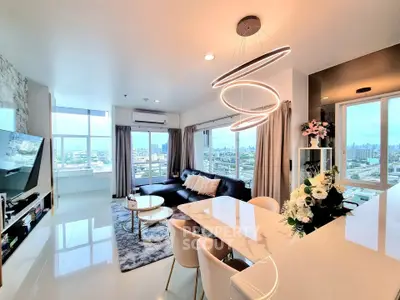 Luxurious modern living room with panoramic city views and elegant lighting