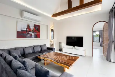 Modern living room with stylish decor and large wooden coffee table