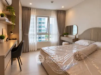 Modern bedroom with elegant decor, large window, and stylish workspace