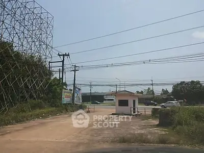 Vacant land plot with small structure, ideal for development opportunities.