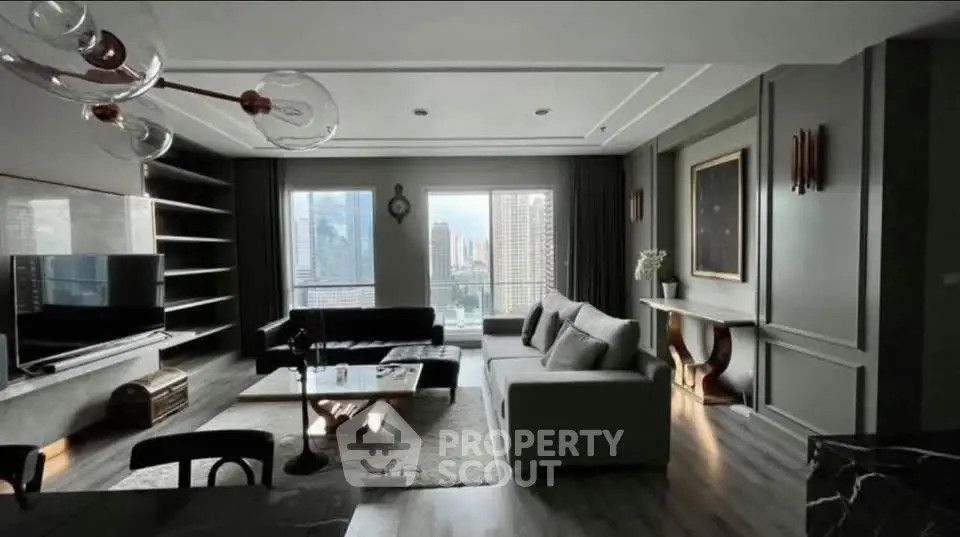 Luxurious modern living room with city view, elegant furniture, and stylish decor.