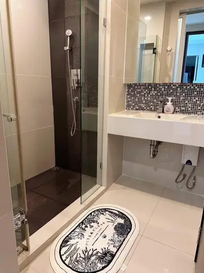 Modern bathroom with glass shower and stylish sink area