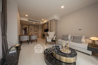 Luxurious modern living room with elegant decor and open kitchen layout