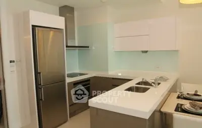 Modern kitchen with sleek appliances and open layout design