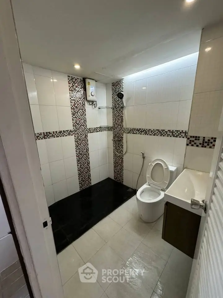 Modern bathroom with sleek shower and stylish tile design