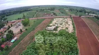 Expansive aerial view of lush agricultural land with potential for development