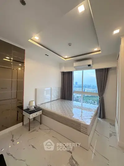Modern bedroom with city view, featuring sleek design and luxurious marble flooring.