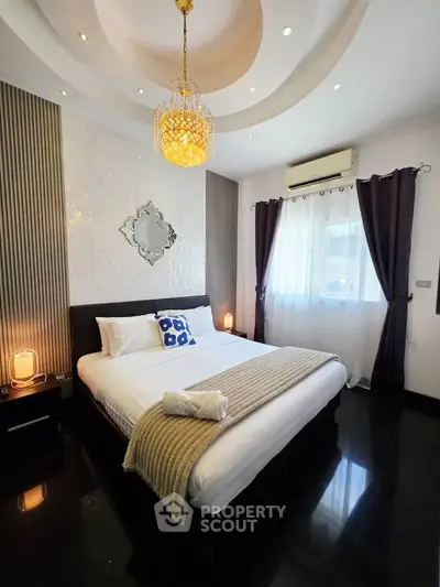 Luxurious bedroom with elegant decor, modern lighting, and cozy ambiance for ultimate relaxation.