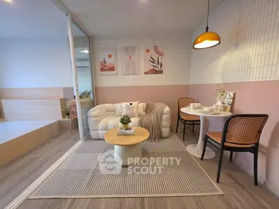 Chic modern living room with cozy seating and stylish dining area, perfect for urban living.