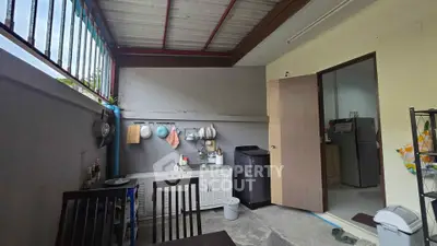 Cozy open-layout kitchen with dining area and modern appliances