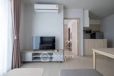 Modern living room with air conditioning and sleek furniture in a cozy apartment.